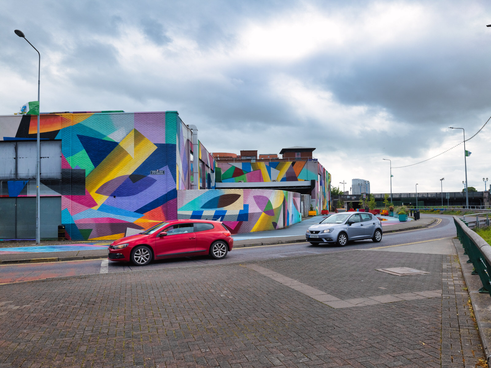 Overview of the Honan's Quay mural by Digo Diego, showcasing its organic forms and vibrant palette, designed to enhance and revitalise the city space