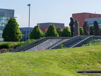 SCULPTURE BY ORLA DE BRI This striking sculpture, "The Bastard Son of Sisyphus", by Orla de Brí, is located in Park West, Dublin. It offers a...