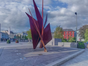 BY EAMONN O'DOHERTY This striking Corten steel sculpture, known as the Quincentennial Sails, was created by Irish artist Éamonn O'Doherty....