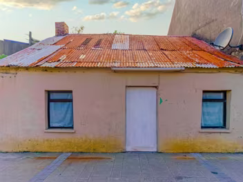 DERELICT WITH TIN ROOF