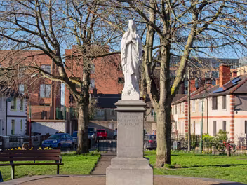 MARIAN STATUE AT OSCAR SQUARE The small urban green space, now commonly known as Oscar Square Park, has a history that intertwines mythology, wartime...