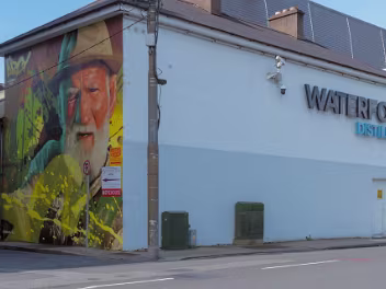 The Fisherman Mural Grattan Quay Ryan Christenson, a Connecticut native, began his artistic journey at a young age. While working in his father's...