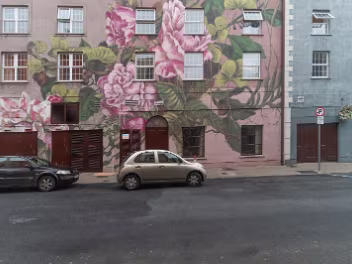 FLOWERS ON THE STREET BY LULA GROCE The story begins with the original mural's creator, Lula Goce. A Spanish artist with a distinctive path, her work is...