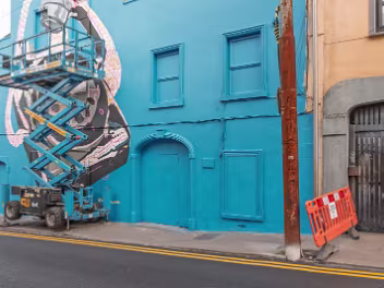 OF THE HOOK WAS A WORK IN PROGRESS The fact that the mural remained unfinished after five days is an inherent part of the public art festival experience....