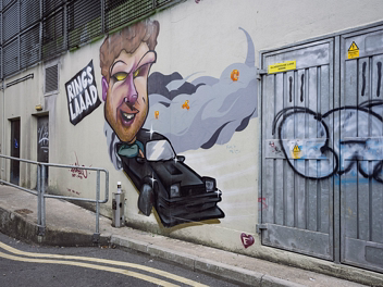 UNOFFICIAL MURAL BY STAYLO An in-depth attribution and site analysis of StayLo's "Rings Lad" street art in Glass House Lane, Waterford, examining...