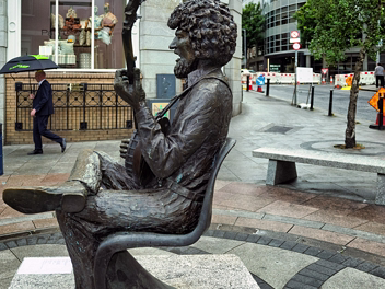 LUKE KELLY STATUE Discover the story of Dublin's iconic Luke Kelly statues. Explore the legacy of The Dubliners' frontman, John Coll's...