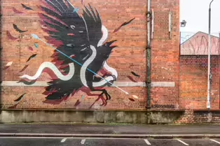 EXAMPLES OF STREET ART BY DANK AND SABEK [ON THE RED BRICK WALL ON TALBOT STREET IN BELFAST]-235445-1 MURAL ON TALBOT STREET