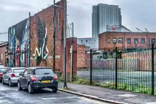 EXAMPLES OF STREET ART BY DANK AND SABEK [ON THE RED BRICK WALL ON TALBOT STREET IN BELFAST]-235447-1