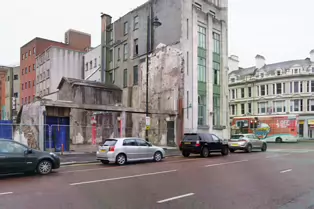 BANK OF IRELAND BUILDING IN BELFAST [IT IS PAINFUL TO SEE THE CONDITION OF THIS BUILDING]-235570-1 THE BELFAST STORIES PROGRAMME 004