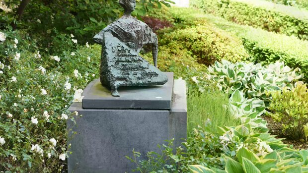RECLINING FIGURE This striking bronze sculpture, "Reclining Figure", by Frederick Edward McWilliam (1909-1992), was relocated in 2013...