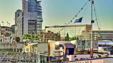 THE BOAT IS A BUILDING IN BELFAST AND IT IS NEAR THE LAGAN WEIR [NOT THE TALLEST BUILDING IN IRELAND]-233298-1 KNOWN AS THE BOAT