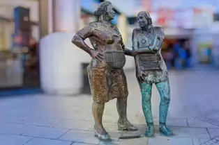 MONUMENT TO THE UNKNOWN WOMAN WORKER [BY LOUISE WALSH AND IT IS LOCATED OUTSIDE THE EUROPA HOTEL]-233216-1 PHOTOGRAPHED BY WILLIAM MURPHY
