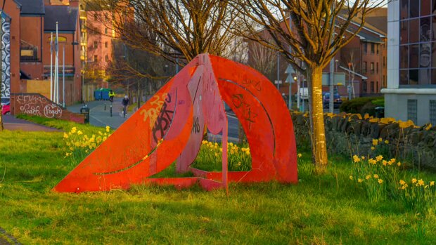 RED METAL SCULPTURE Based on these sources, it is safe to say that the sculpture is indeed called "Greenland 1983" and was created by Bob...