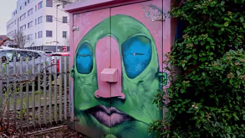 PAINT-A-BOX STREET ART BY KVLR Explore the vibrant world of Belfast street art at C.S. Lewis Square. This stunning "Paint-A-Box" utility cabinet is a...