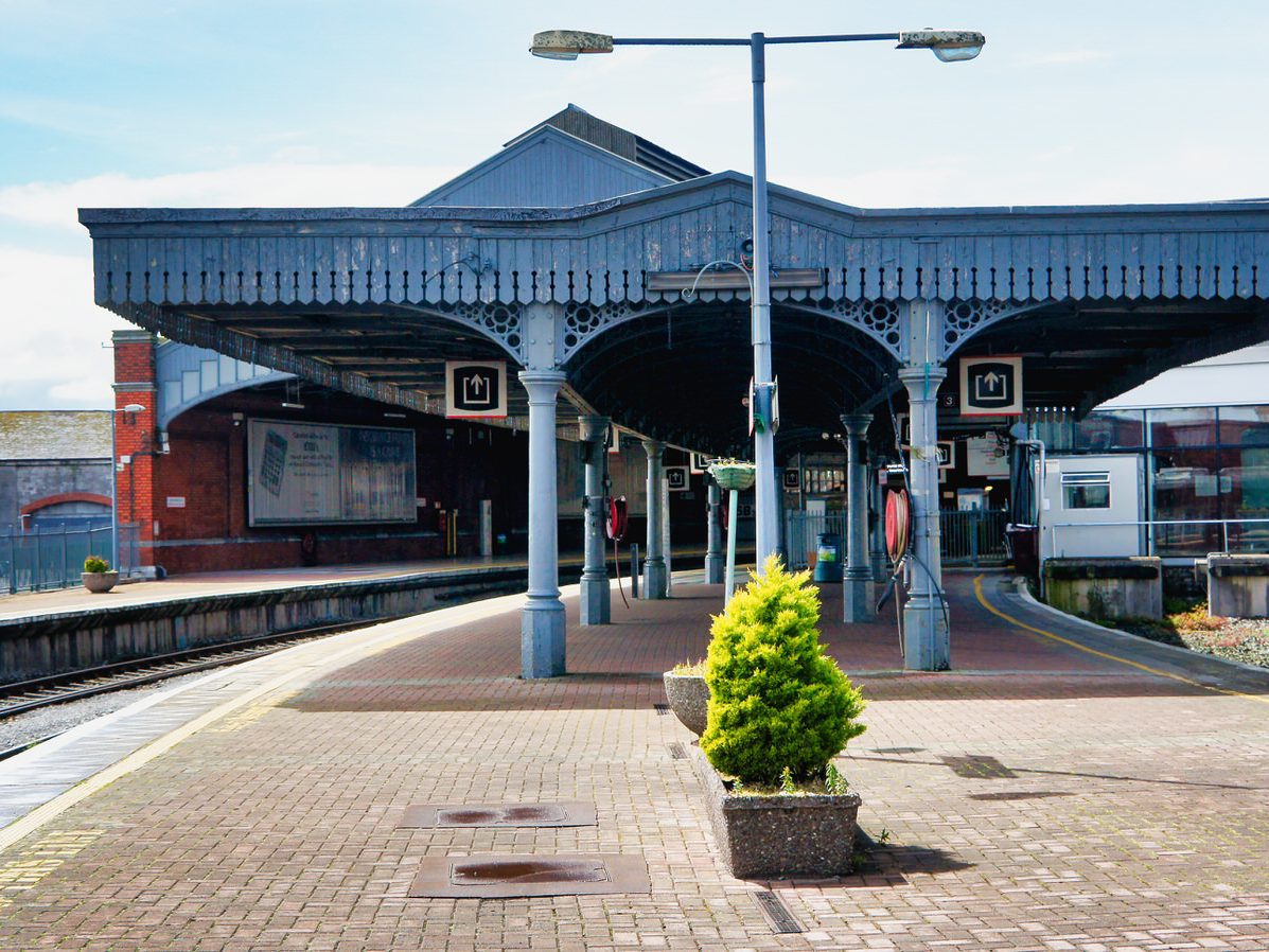 CORK TO COBH SERVICE AT KENT TRAIN STATION [2 YEARS BEFORE THE STATION WAS BADLY DAMAGED BY A FREAK STORM] 0012