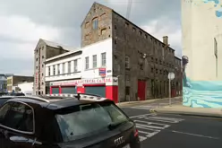 THE FISHERMEN MURAL BY FINTAN McGEE [AT THE CORNER OF ANNE STREET AND ROCHES STREET LIMERICK]-244680-1