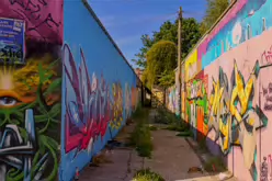 ST PETERS LANE IN PHIBSBOROUGH [BACK IN JULY 2022 IT HOSTED SOME MURALS BUT THE QUALITY WAS IN DECLINE]-244056-1