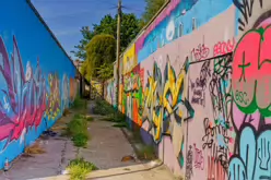 ST PETERS LANE IN PHIBSBOROUGH [BACK IN JULY 2022 IT HOSTED SOME MURALS BUT THE QUALITY WAS IN DECLINE]-244057-1