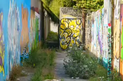 ST PETERS LANE IN PHIBSBOROUGH [BACK IN JULY 2022 IT HOSTED SOME MURALS BUT THE QUALITY WAS IN DECLINE]-244058-1
