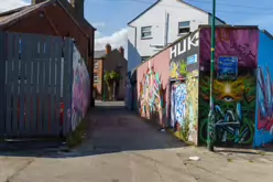 ST PETERS LANE IN PHIBSBOROUGH [BACK IN JULY 2022 IT HOSTED SOME MURALS BUT THE QUALITY WAS IN DECLINE]-244061-1