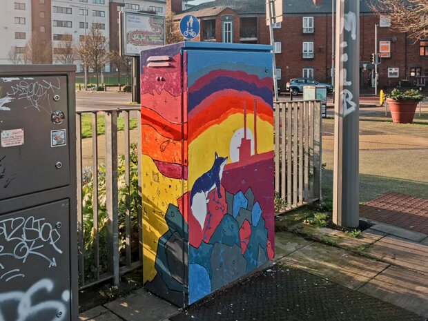 BY JACK COLEMAN Tucked beneath the silent, steel arches of Spencer Bridge, a vibrant splash of colour disrupts the industrial...