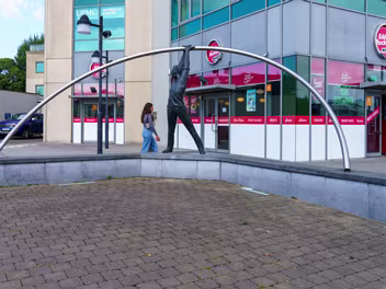 LEANING MAN