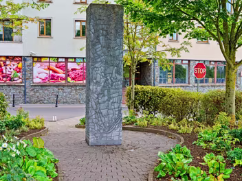 BY MICHELLE BYRNE The plaque describes this stone sculpture map of Carlow town and the River Barrow as a sculpture created by artist...