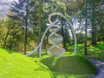 DNA SCULPTURE MAY 2013 The sculpture is a large, double-helix structure made of stainless steel. It stands over 20 feet tall and is located...