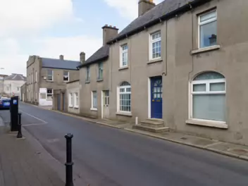 COLLEGE STREET College Street in Carlow, Ireland, is a historic thoroughfare that encapsulates the town's rich history and...