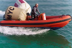 A MAN AND HIS TWO BUOYS IN A RIB [THE DMYC IN DUN LAOGHAIRE]-269717