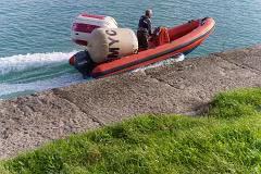 A MAN AND HIS TWO BUOYS IN A RIB [THE DMYC IN DUN LAOGHAIRE]-269718