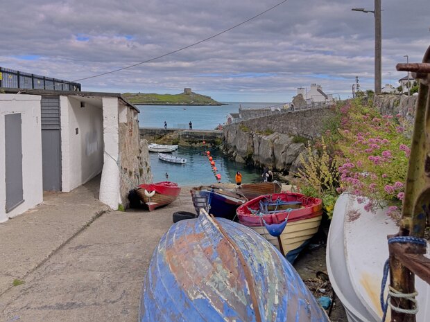 COLIEMORE HARBOUR JULY 2022 Coliemore Harbour is a small, historic harbour that has served as a vital hub for the local community for centuries....