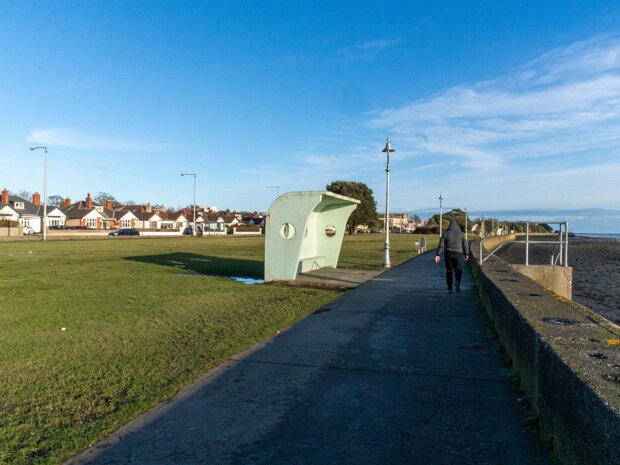 THE WIND SHELETER THE WIND SHELTERS AND THE BANDSTAND ALONG CLONTARF PROMENADE [REMAIN AS A TRIBUTE TO HERBERT SIMMS]