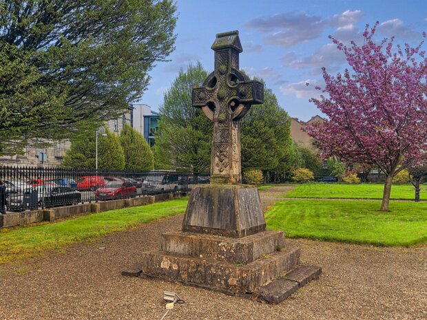 THE FOUR MASTERS The Four Masters Memorial, a striking Celtic cross sculpted by James Cahill, stands within a small, privately owned park...
