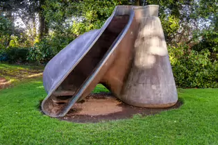 THIS UNTITLED SCULPTURE EXPLORES THE FORM OF A GLASS FLASK [BY TONY CRAGG]-247754-1