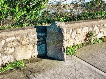 MILESTONE ON ROCK ROAD