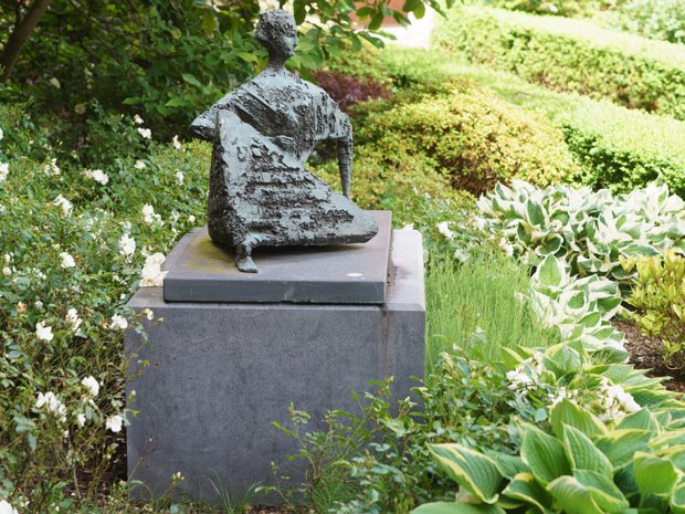 RECLINING FIGURE This striking bronze sculpture, "Reclining Figure", by Frederick Edward McWilliam (1909-1992), was relocated in 2013...
