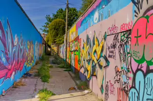 ST PETERS LANE IN PHIBSBOROUGH [BACK IN JULY 2022 IT HOSTED SOME MURALS BUT THE QUALITY WAS IN DECLINE]-244057-1