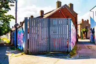 ST PETERS LANE IN PHIBSBOROUGH [BACK IN JULY 2022 IT HOSTED SOME MURALS BUT THE QUALITY WAS IN DECLINE]-244059-1