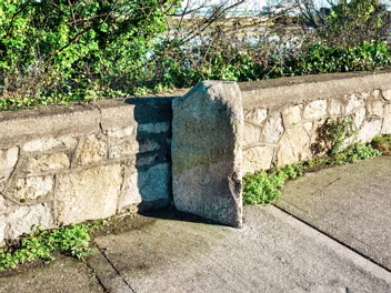 MILESTONE ON ROCK ROAD