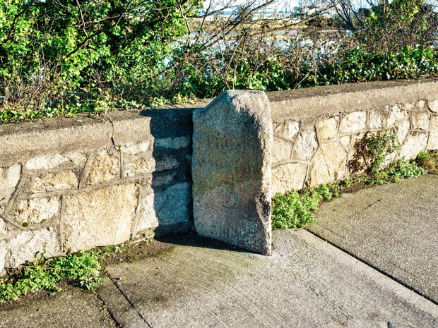 MILESTONE ON ROCK ROAD