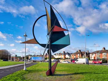 DYNAMIC WIND SCULPTURE This striking wind sculpture by Éamonn O'Doherty dominates the promenade in Clontarf, Dublin. Its kinetic energy and...