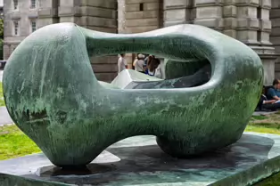 RECLINING CONNECTED FORM AT TRINITY COLLEGE [SCULPTURE BY HENRY MOORE]-253313-1
