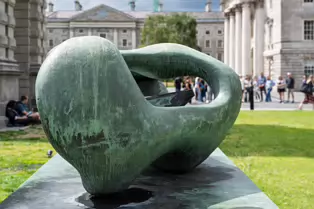 RECLINING CONNECTED FORM AT TRINITY COLLEGE [SCULPTURE BY HENRY MOORE]-253315-1
