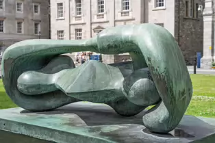 RECLINING CONNECTED FORM AT TRINITY COLLEGE [SCULPTURE BY HENRY MOORE]-253318-1