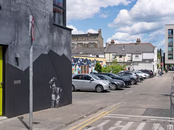 URBAN EXPRESSION AND DEPRESSION Photographs taken on Sussex Street in Dún Laoghaire on 3rd July 2025 capture a scene of stark contradiction. One wall of...