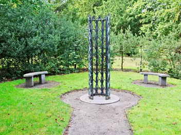 MISSING PERSONS The "Monument To Missing Persons" is a deeply moving sculpture that captures the profound sense of loss and longing...