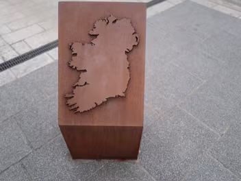 DETAILS OF THE WOODGATE SCULPTURE The discussion of memorials in Ireland sheds crucial light on the often-overlooked reality of underage boy soldiers in...