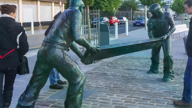 DOCKERS MONUMENT The Dockers’ Sculpture in Limerick, also known as the Dockers’ Monument, is a significant piece of public art that pays...