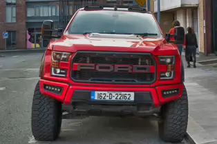 OH YES THERE ARE AMERICAN CARS IN THE EU [THIS RED FORD WAS PARKED ON MOUNTJOY STREET]-248540-1